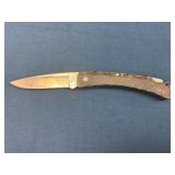 Folding Pocket Knife with Textured Handle and Stee