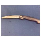 Folding Saw with Serrated Blade and Plastic Handle