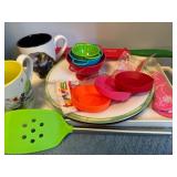 Various Kitchen Goods Including Utensils and Table