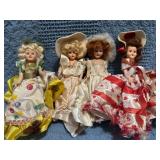 Four Vintage Collectible Dolls in Assorted Dresses