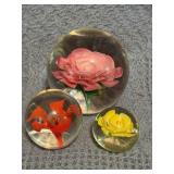 Three Glass Paperweights with Floral Designs