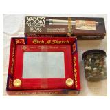 Etch A Sketch, Tasco Zoom Telescope, and Jar of Ma