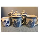 Four Blue and White Willow-Style Mugs with Lids an