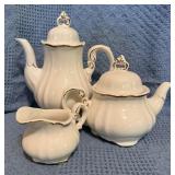 White Teapot, Coffee Pot, and Cream Pitcher Marked
