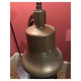 Large Brass Bell Mounted on a Wooden Stool with 'U