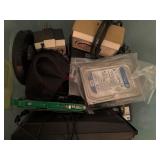 Various Tech Items Including Hard Drives and Porta