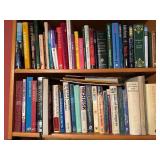 Two Shelves of Mixed Hardcover and Paperback Books