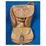 Two Brown Leather Crossbody Bags Featuring Unique