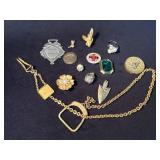 Pins, Charms, and Jewelry Items Including Medallio