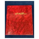 Red Spiral-Bound Photo Album with Global Stamp Col