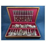 Complete Set of Stainless Steel Flatware in Wooden