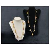 Two Gold-Tone Necklaces With Enameled Egg Charms