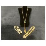 Two Gold-Tone Necklaces and a Seashell Necklace