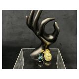 Egg-Shaped Jeweled Pendants with Green, Clear, and