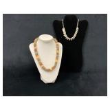 Two Necklaces Including Beaded Strand and Leaf Mot