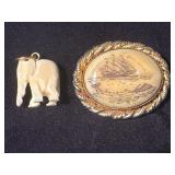 Carved Bone Pendant and Brooch Featuring Elephant