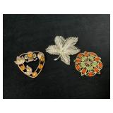 Three Vintage Brooches: Leaf, Floral, and Gemstone