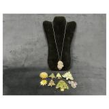 Holiday-Themed Jewelry Including Pins and Necklace