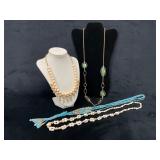 Four Beaded and Chain Necklaces with Various Desig