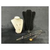 Four Necklaces Including Pendant and Beaded Design