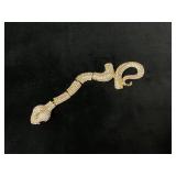 Gold-Tone Snake Jewelry Piece With Rhinestone Embe