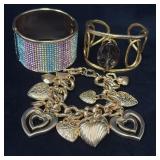 Three Gold Tone Bracelets