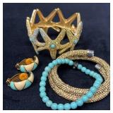 Three Bracelets and Clip-On Enk