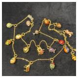 Gold Tone Chain With 18 Faberge Style Charms