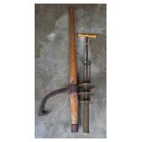 Old Log Roller and Primitive Hand Pump