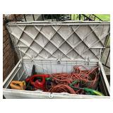 Storage Bin With Garden Power Tools and Cords