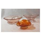 Three Pink and Marigold Glass Bowls