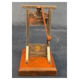 Miniature Metal Guillotine with Wooden Base