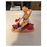 Figurine Woman in Bikini on Red Scooter