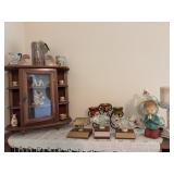 Wooden Curio Cabinet With Figurines and Trophies
