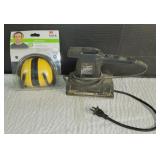 Earmuffs and Black & Decker Sander