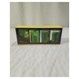 Vintage John Deer Historical Four Piece Toy Set