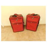 2 Voyager rolling suitcases