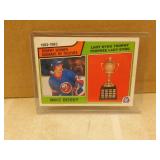 1983-84 OPC Mike Bossy #205 Lady Bing Trophy