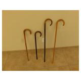 3 wooden canes -  various sizes