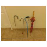 3 metal canes / umbrella