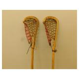 2 Lacross sticks  43 in long