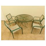 Metal patio table and 4 chairs  4 ft diameter