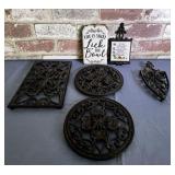 (6 PCS) 5 CAST IRON TRIVETS & 1 ENAMEL SIGN