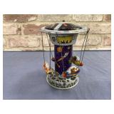 SCHYLLING ROCKET CAROUSEL TIN TOY