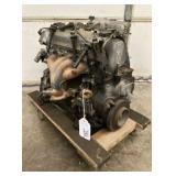 HONDA 4 CYLINDER ENGINE ON FLOOR DOLLY