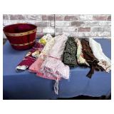 BUSHEL BASKET WITH 7 VINTAGE APRONS