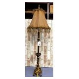ANTIQUE GOLD TABLE LAMP WITH FRINGED SHADE