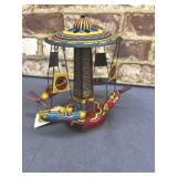 VINTAGE SCHYLLING ROCKET RIDE CAROUSEL TIN TOY