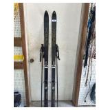 PAIR OF VINTAGE BLACK AND GOLD "HEAD" DOWNHILL