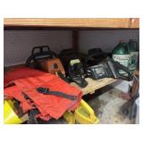 CONTENTS OF SHELF:  3 PORTABLE CHAINSAWS & CHAIN